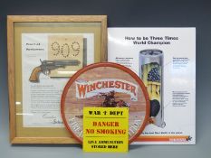 Four gun / ammunition advertising / shop display signs and posters including Winchester Firearms