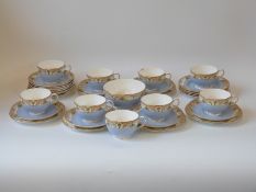 A quantity of Royal Worcester teaware comprising nine cups, 11 saucers,