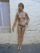 A vintage female shop display mannequin