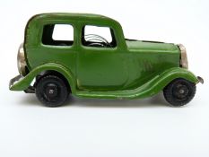 Tri-ang Minic clockwork tinplate Ford Saloon with green body and black wheels