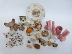 A quantity of collectable ceramics to include Wade animals,