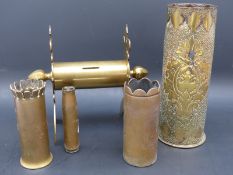 Five pieces of trench art, one in the form of a money box,