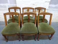 A set of late 19thC / early 20thC oak dining chairs
