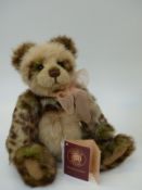 Charlie Bears Teddy Bear Olive, with part leopard print mohair, bow and jointed limbs,