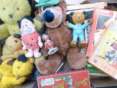 A collection of children's TV related items including Sooty and Sweep,