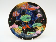 A Samson Hancock and Sons Art Deco plate signed by Molly Hancock,