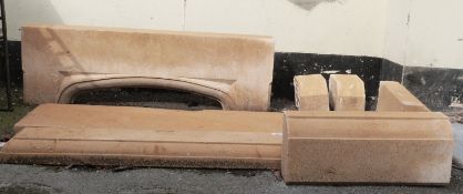 A carved natural stone fireplace,