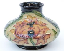 Moorcroft vase of squat form in the Fireflower pattern, 8cm tall,