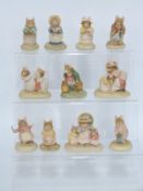 Twelve Border Fine Arts Brambly Hedge figures with 11 tins
