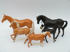Beswick Black Beauty and foal,