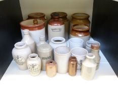 A collection of stoneware jars, bottles etc, to include Timothy Whites, Virol, Hills,