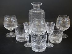 A partial suite of Stuart Crystal drinking glasses comprising decanter, three tumblers,