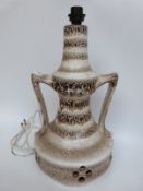 A large retro West German pottery lamp with lava decoration,