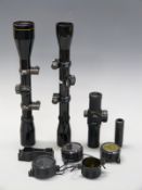 Three rifle scopes comprising Nikko Sterling, Bushnell 4x Banner and a Hawke, two with mounts,