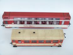 LGB G gauge Glacier Express passenger coach and another LGB passenger coach