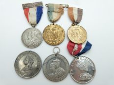 Three King George VI and Queen Elizabeth Coronation medals together with an Edward VIII Coronation
