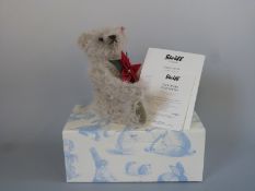 Steiff Teddy Bear Poinsettia with grey mohair, flower and jointed limbs, limited edition 602/1500,
