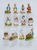 Twelve Border Fine Arts Beatrix Potter figures in boxes