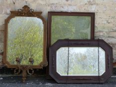 Three mirrors, one a gilt example with double candle sconce,