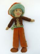 Nora Wellings felt doll with Mexican style outfit and original tag to foot,