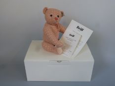 Steiff Teddy Bear Aluna Paradise with apricot woven fur, flower brooch and jointed limbs,