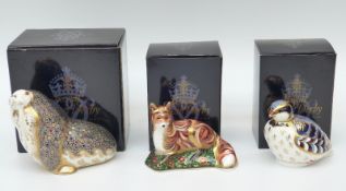 Three Royal Crown Derby paperweights comprising Walrus, Fox Cub and Red-legged Partridge,