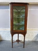 A 19thC astragal glazed mahogany corner cupboard on stand,