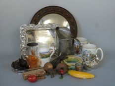 A collection of items to include carved items, cigarette lighter, bottle filler, lead soldier,