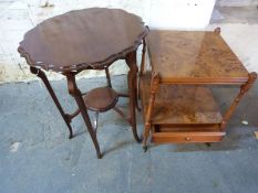 A six legged early 20thC occasional table and a burr wood table