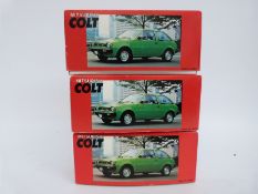 Three Japanese Mitsubishi Colt scale model cars,