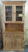 A small glazed pine dresser W92 x D45 x H199cm