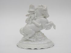 A Rosenthal blanc de chine figure of a cherub on horseback,