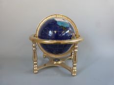 A hardstone / specimen inlaid globe