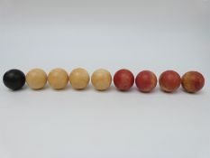 Eight late 19th or early 20th century ivory snooker / billards balls,