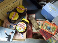 A collection of games and advertising items including Tuskers The Adventures of Henry, Disney hippo,