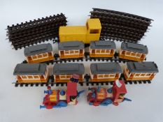 A quantity of Lehmann Gnomy model trams, two Corgi Magic Roundabout locomotives,