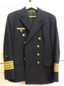 A German WWII naval reefer jacket with Keil makers name to interior with gilt insignia for a Nazi