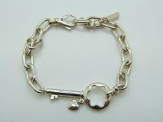 A MontBlanc silver bracelet with key decoration