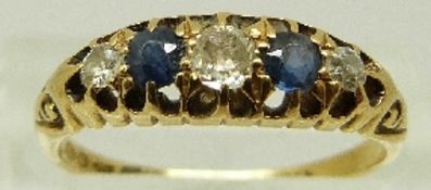 An 18ct gold ring set with diamonds and sapphires, London 1913, size M, 2.