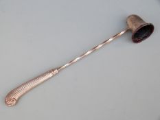 Hallmarked silver candle snuffer with pistol grip and rope twist stem,