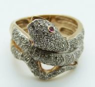 A 9ct gold ring in the form of a snake with diamonds and ruby eyes, size O/P, 7.