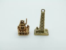 A 9ct gold charm in the form of the Hancock Building,
