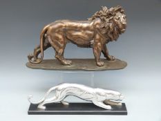 A chromed Art Deco style figure of a jaguar and a model of a lion, length 46cm,