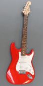 Stratocaster Squier Fender Strat electric guitar in red lacquered finish no.