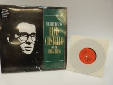 The Very Best of Elvis Costello double album complete with 7-inch single and inserts.