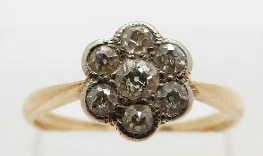 A 18ct gold ring set with diamonds in a daisy cluster, size L/M, 2.