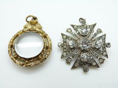 A Victorian silver pendant set with paste and a Victorian gilt locket