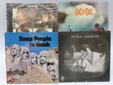 Approximately 30 LPs including The Beatles,