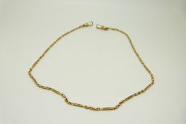 A 9ct gold Albert/ fob chain of knotted and elongated links
