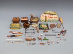 A collection of bijouterie including Air Mail needle book, miniature corkscrew, fruit / penknives,